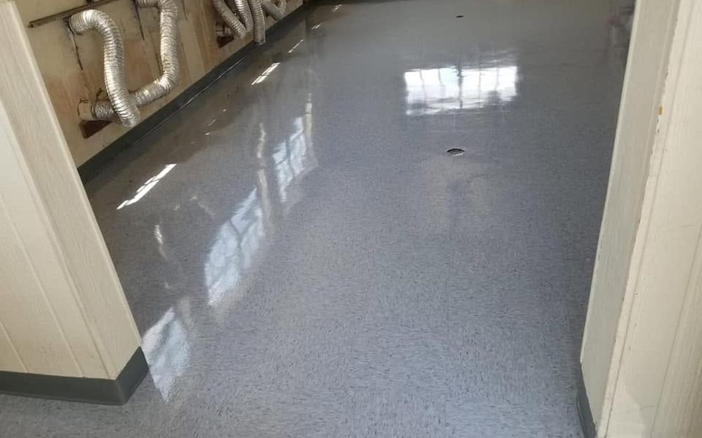 A stripped and waxed floor with a high-gloss finish