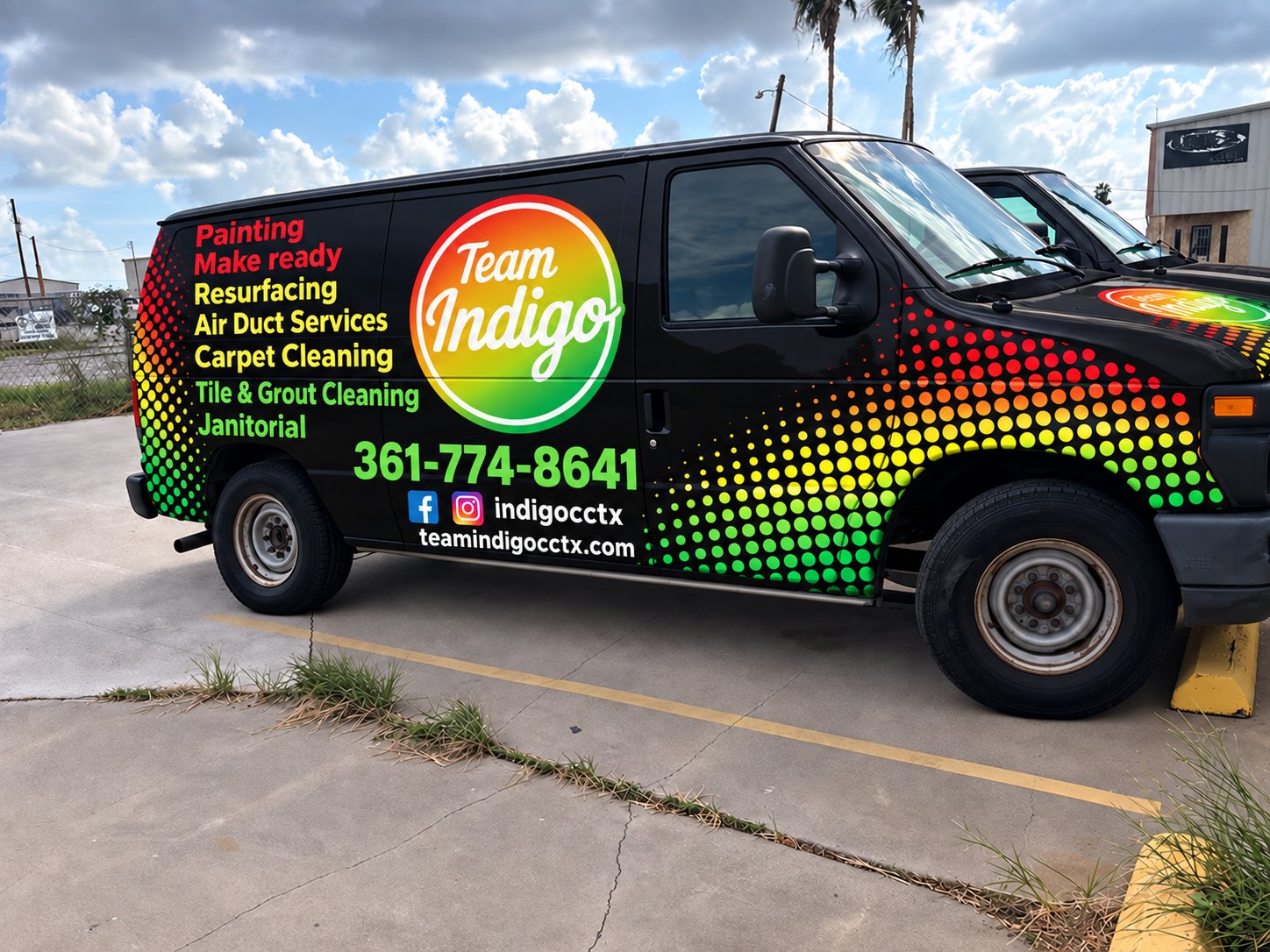 Team Indigo work van in the full company wrap, with the services, phone number and website on the side